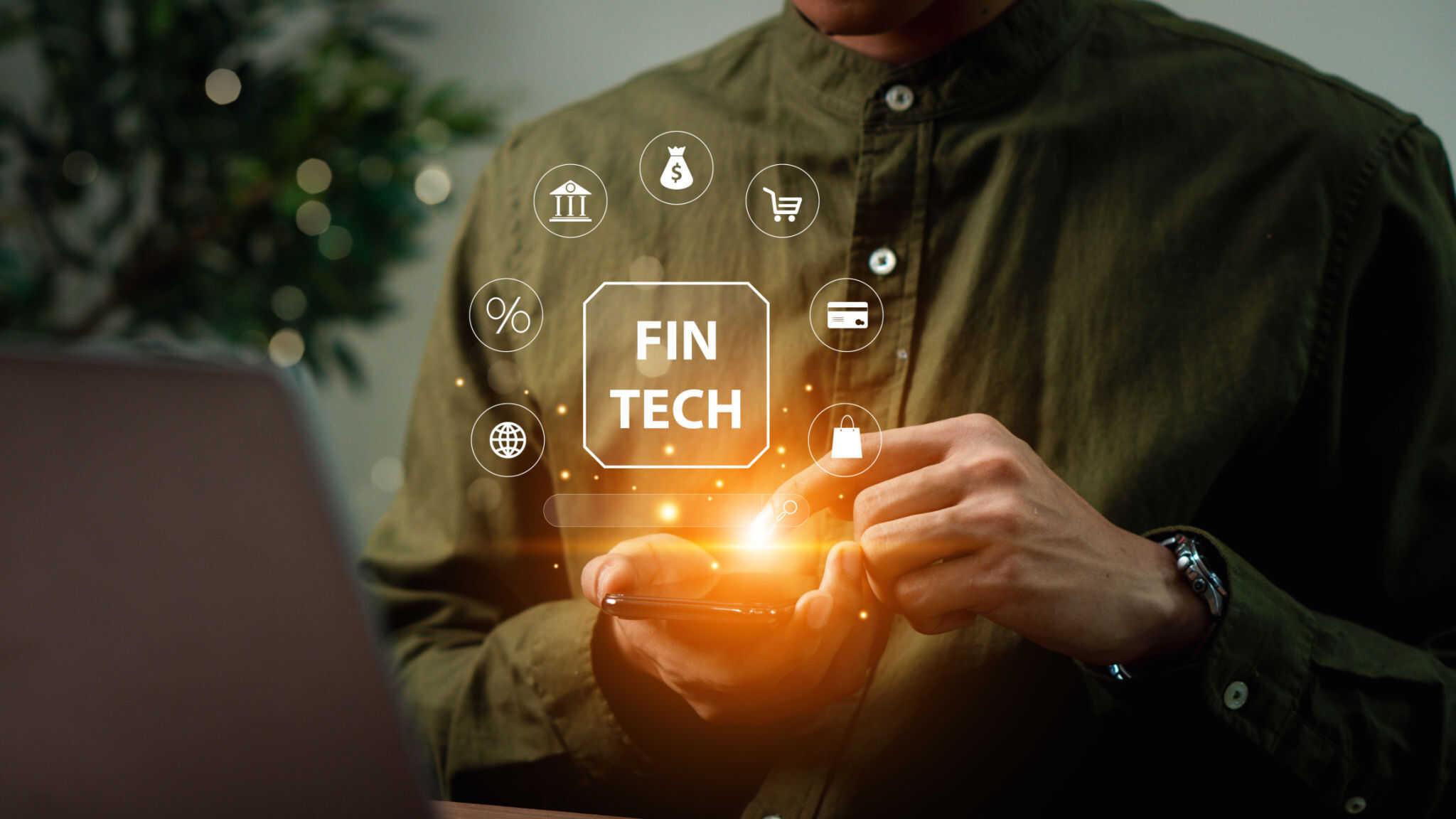 FinTech, Financial technology, Digital banking, AI, Online banking and digital money. Businessman using smartphone with digital finance icons, Internet payment, online shopping, financial technology